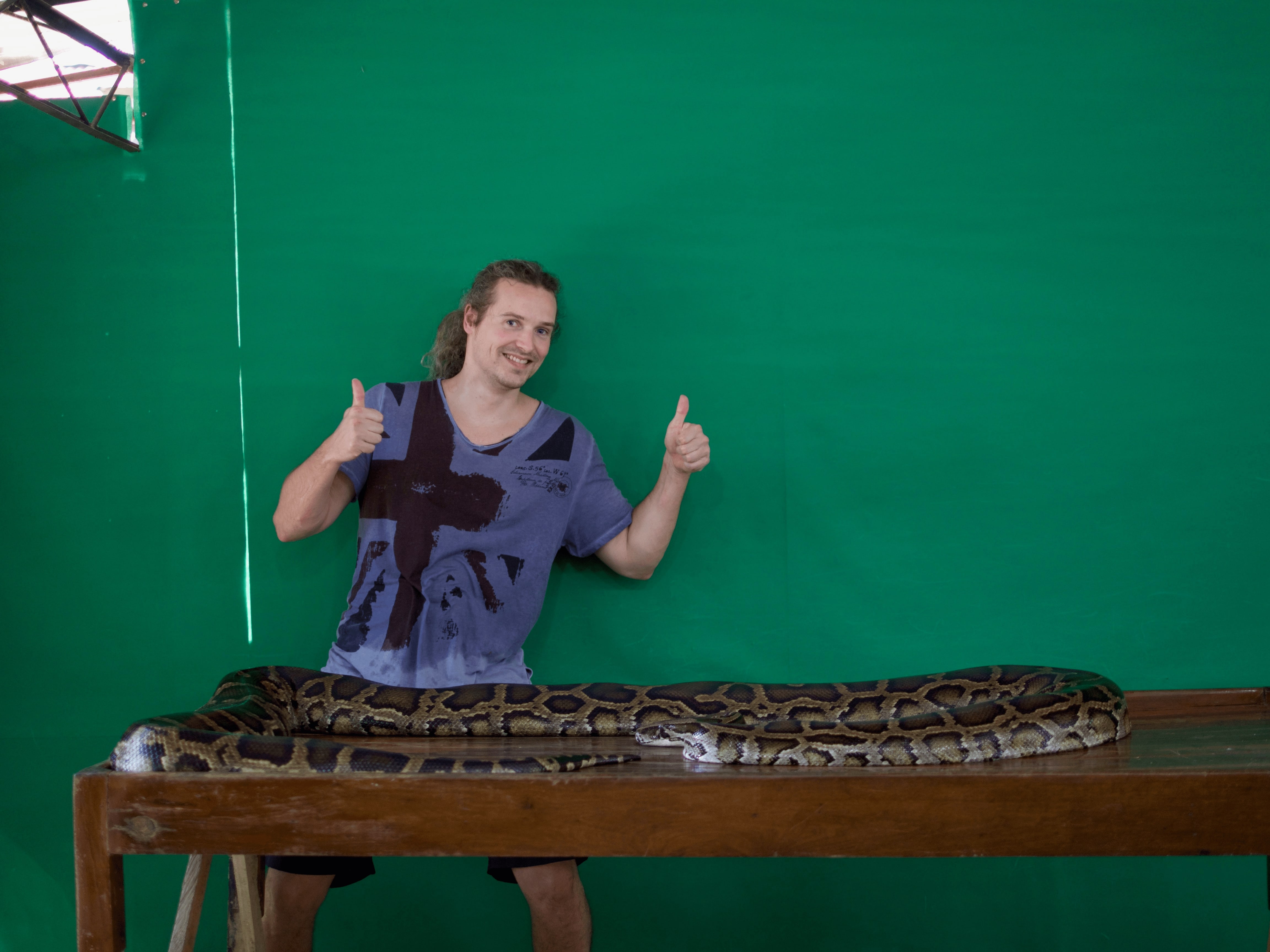 lennythroughparadise posing with boa constrictor at Palawan Wildlife Rescue and Conservation Centre